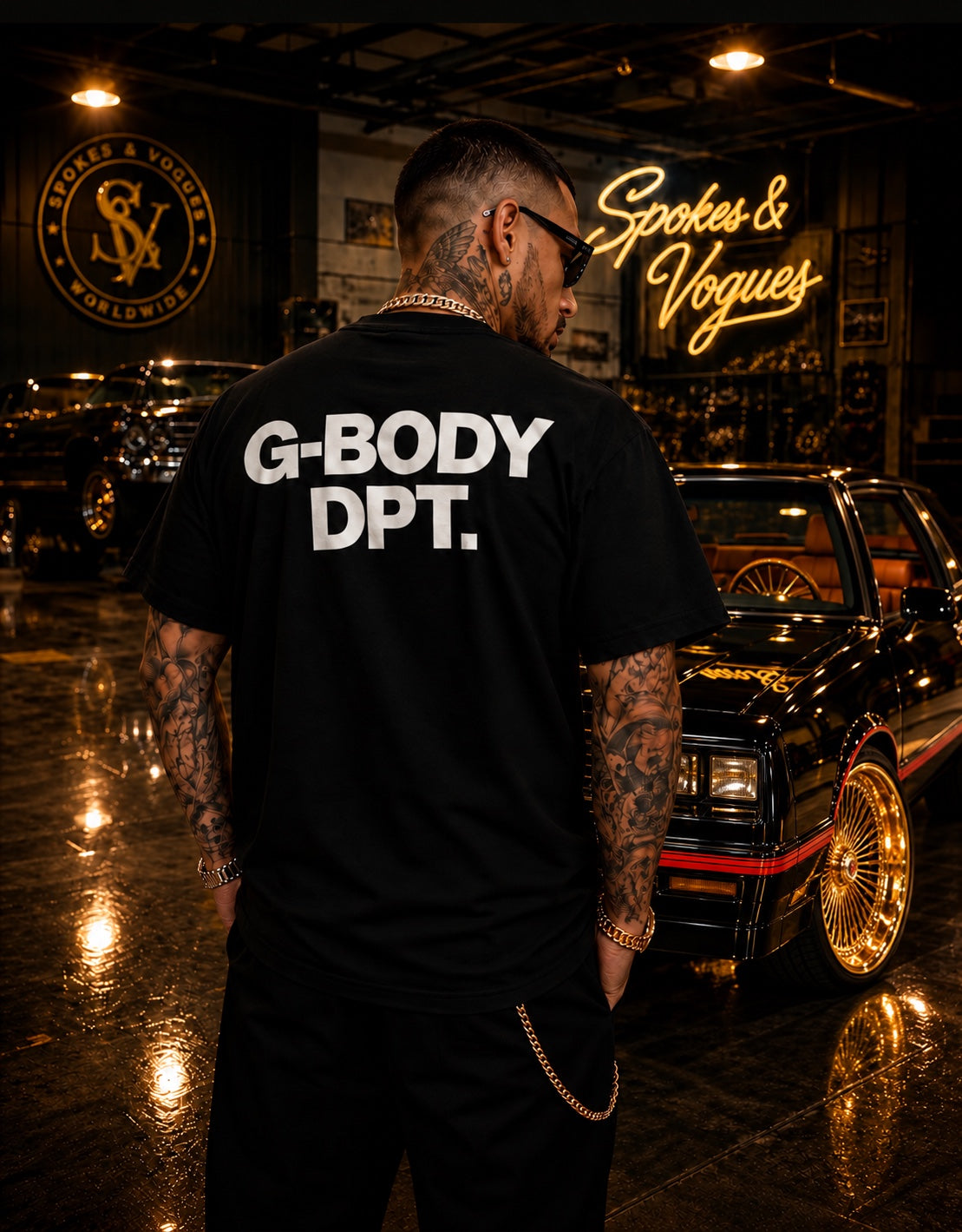Model wearing the black G-BODY DPT. tee with large white back print