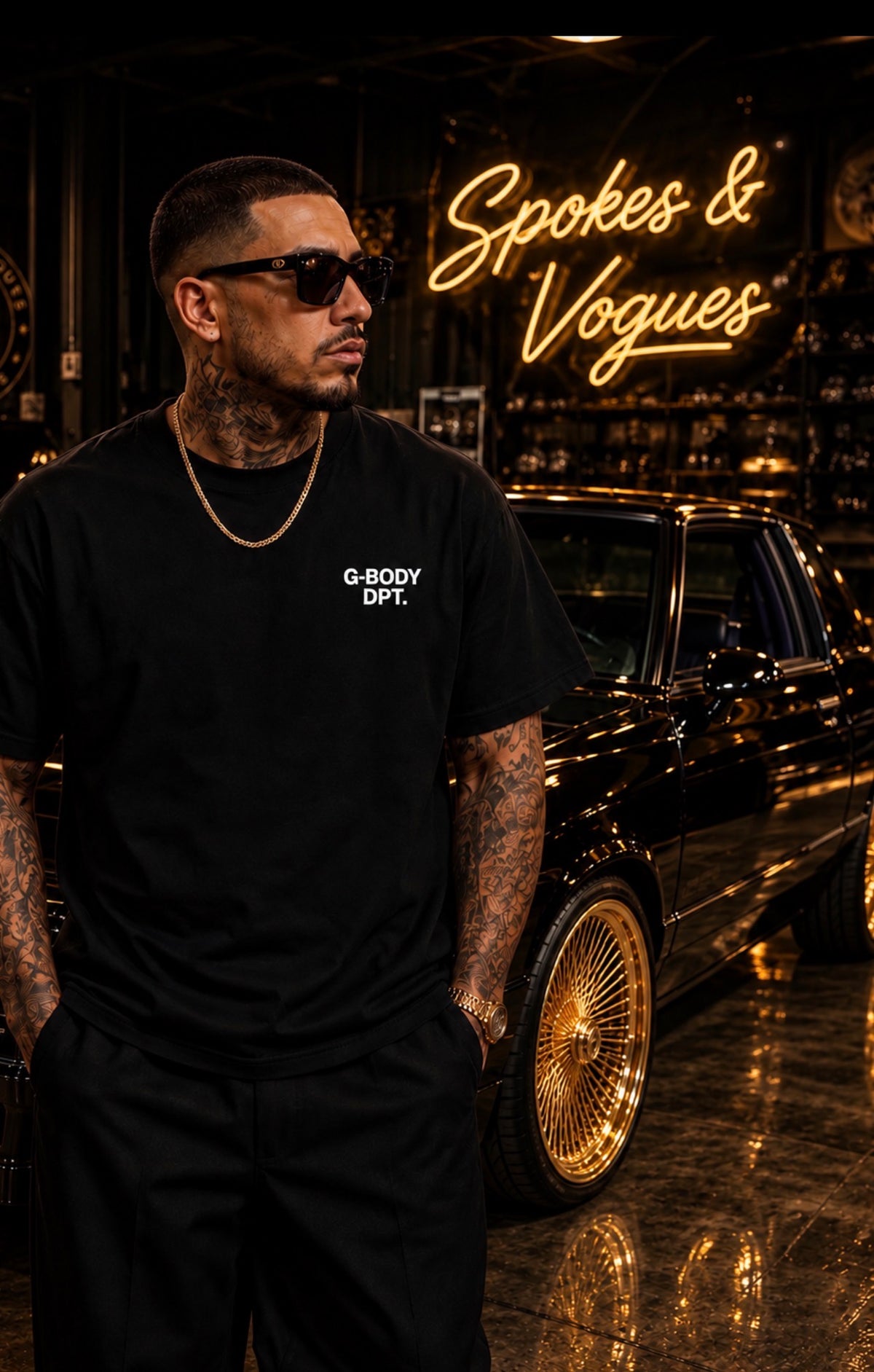 Model wearing the black G-BODY DPT. tee with small white front chest print
