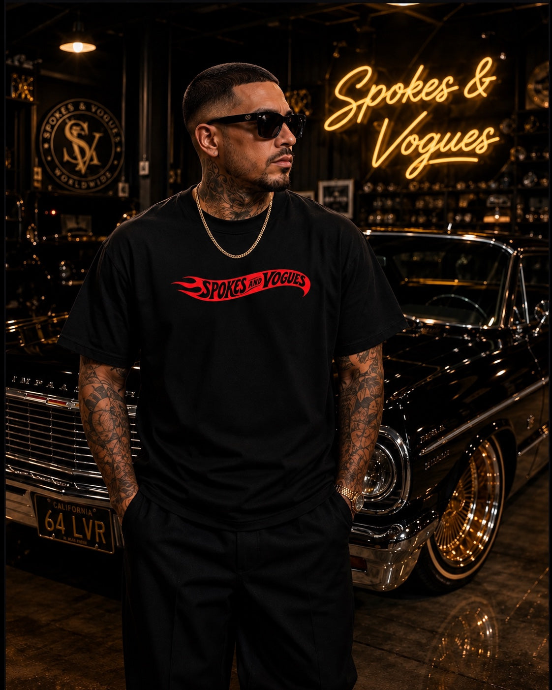 Model wearing Spokes & Vogues red flame logo black T-shirt
