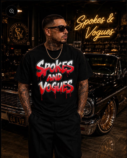 Model wearing Spokes & Vogues red and white drip logo black T-shirt